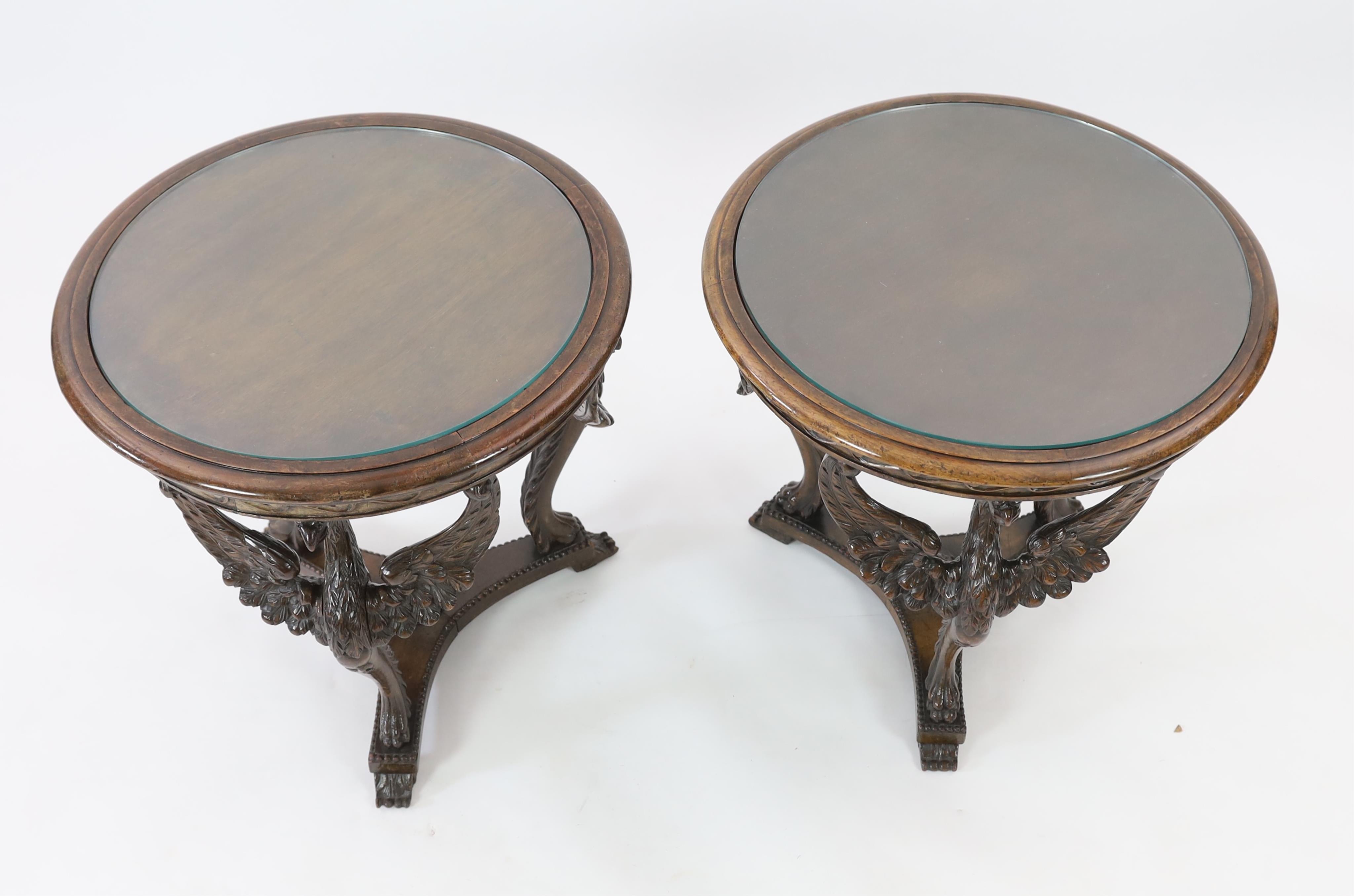 A pair of walnut occasional tables